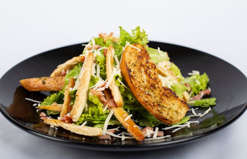 Fresh Caesar salad with croutons and Parmesan